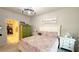 Cozy bedroom with an inviting bed, walk-in closet and soft natural light at 1875 Spring Shower Cir, Kissimmee, FL 34744