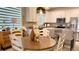 Beautiful kitchen with stainless steel appliances, countertops, and barstool seating for informal dining at 1875 Spring Shower Cir, Kissimmee, FL 34744