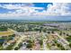 Community aerial view with lush greenery, highlighting the homes and landscape in a desirable neighborhood at 1912 Maury Rd, St Cloud, FL 34771