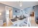 Open-concept dining area with bright decor and seamless access to the foyer and kitchen at 1912 Maury Rd, St Cloud, FL 34771