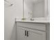 Bathroom with modern white vanity, cabinet storage and modern fixtures at 19267 Allium Pl, Orlando, FL 32827