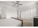 Spacious bedroom featuring plush carpet and a ceiling fan at 19267 Allium Pl, Orlando, FL 32827