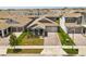 Charming single-Gathering home with a well-manicured lawn, two car garage, and brick paved driveway at 19267 Allium Pl, Orlando, FL 32827
