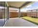 Covered patio overlooking a fenced-in backyard, perfect for outdoor entertaining at 19267 Allium Pl, Orlando, FL 32827