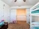 This ' room features bunk beds and a closet with sliding doors at 209 Willow Bend Dr, Davenport, FL 33897