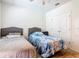 Bedroom with twin beds and closet at 209 Willow Bend Dr, Davenport, FL 33897