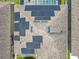 Aerial view of a home with solar panels installed on the roof at 209 Willow Bend Dr, Davenport, FL 33897