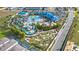 Aerial view of the resort's expansive water park, featuring pools, slides, mini golf and various recreational activities at 2161 Lelani Cir, Davenport, FL 33897