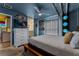 Themed bedroom with spaceship wall art, custom headboard and unique lighting at 2161 Lelani Cir, Davenport, FL 33897