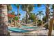 Relaxing hammock park featuring multiple hammocks nestled among palm trees and sandy grounds at 2161 Lelani Cir, Davenport, FL 33897