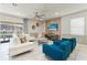 Comfortable living room with contemporary furnishings and access to the outdoor patio at 2161 Lelani Cir, Davenport, FL 33897