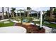 Fun mini-golf course with landscaped greens, decorative rocks, and small water features throughout the community at 2161 Lelani Cir, Davenport, FL 33897