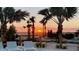 Enjoy relaxing evenings in the community lounge area with hammocks and comfortable seating at sunset at 2161 Lelani Cir, Davenport, FL 33897
