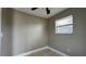 Neutral-toned bedroom with standard window at 2326 St Marteen Ct, Kissimmee, FL 34741