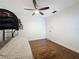 Bright bedroom features wood floors, a ceiling fan, and a convenient built-in bunk bed at 238 Sunridge Woods Blvd, Davenport, FL 33837