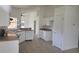 Spacious kitchen area with white cabinets, updated appliances, and lots of storage at 2401 Cedarfield Ln, Kissimmee, FL 34744