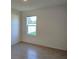 Bright bedroom featuring neutral paint and natural light at 2722 Numa Falls Ave, Davenport, FL 33837