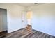 Bedroom with wood-look flooring, neutral walls and a closet at 2722 Numa Falls Ave, Davenport, FL 33837