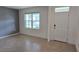 Open-concept living area featuring tile floors and neutral paint, creating a bright and airy space at 2722 Numa Falls Ave, Davenport, FL 33837