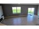 Spacious living area featuring tile floors, neutral paint, and natural light at 2722 Numa Falls Ave, Davenport, FL 33837