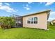 Well-maintained exterior showing the stucco siding and screened-in patio at 2736 Southland St, St Cloud, FL 34772