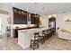 Modern kitchen featuring a large island with bar seating and top of the line appliances at 2736 Southland St, St Cloud, FL 34772