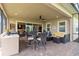 Relaxing screened patio with dining and lounging areas, ideal for entertaining guests at 2736 Southland St, St Cloud, FL 34772