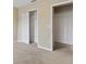 Bedroom featuring neutral carpet and large closets at 2832 Osprey Cove Pl # 102, Kissimmee, FL 34746
