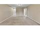 Spacious living room with neutral carpet and fresh paint at 2832 Osprey Cove Pl # 102, Kissimmee, FL 34746