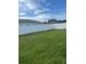 Large backyard with a white fence at 306 Clermont Dr, Kissimmee, FL 34759