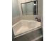 Bathroom features a spacious corner tub at 306 Clermont Dr, Kissimmee, FL 34759