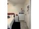 Bright bedroom with neutral walls featuring white dressers for ample storage at 306 Clermont Dr, Kissimmee, FL 34759