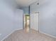 Spacious bedroom featuring tile flooring, closet, and access to bathroom at 3228 Fairfield Dr, Kissimmee, FL 34743