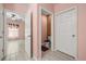 Hallway featuring access to a bedroom, a bathroom, and an additional room at 3797 Briarwood Estates Cir, St Cloud, FL 34772