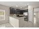 Modern kitchen with granite countertops, stainless steel appliances, and ample cabinet space at 3797 Briarwood Estates Cir, St Cloud, FL 34772