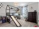 Fun bedroom featuring a bunk bed with a slide, dinosaur theme, and playful decor for an adventurous spirit at 3853 Cortland Dr, Davenport, FL 33837