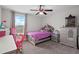 Bright bedroom featuring plush décor, neutral paint and an abundance of sunlight at 3853 Cortland Dr, Davenport, FL 33837