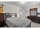 Neutral bedroom with a warm and inviting atmosphere featuring a Queen bed and accent furniture at 3853 Cortland Dr, Davenport, FL 33837