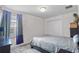 Bright bedroom with an accent wall, ceiling fan and modern blinds allowing lots of natural light at 3853 Cortland Dr, Davenport, FL 33837
