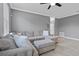Inviting living room with a cozy sectional sofa, neutral decor, and ample space for entertaining or relaxing at 3853 Cortland Dr, Davenport, FL 33837