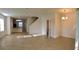 Bright living room featuring tile flooring, an open layout, and ample natural light at 403 Arbor Lakes Dr, Davenport, FL 33896