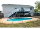 Backyard featuring a pool, deck, outdoor seating and room for entertaining and relaxation at 4151 Nelson Rd, Lake Wales, FL 33898
