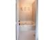 Bright bathroom featuring a relaxing soaking tub with stylish art pieces hung above at 4151 Nelson Rd, Lake Wales, FL 33898