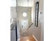 Bright foyer featuring hardwood floors, a staircase, an octagonal window and decor at 4151 Nelson Rd, Lake Wales, FL 33898