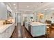 Gourmet kitchen features a large center island, custom cabinets, and stainless steel appliances at 4224 Clarice Estates Dr, Windermere, FL 34786