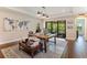 Bright office space with hardwood floors, built-ins, and access to the covered lanai at 4224 Clarice Estates Dr, Windermere, FL 34786