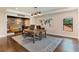 Spacious office with hardwood floors and an adjacent media room, perfect for working from home at 4224 Clarice Estates Dr, Windermere, FL 34786