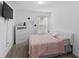 Cozy bedroom with neutral tones, soft carpeting, and a comfortable queen-sized bed at 4338 Finch Ln, Kissimmee, FL 34746
