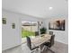 Bright dining area with large slider door providing plenty of natural light and backyard views at 4338 Finch Ln, Kissimmee, FL 34746