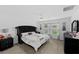Beautiful main bedroom with large bed, ceiling fan and ample natural light at 4338 Finch Ln, Kissimmee, FL 34746